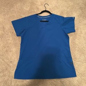 Wonderwink royal blue scrub top. size MEDIUM. Lightly worn.